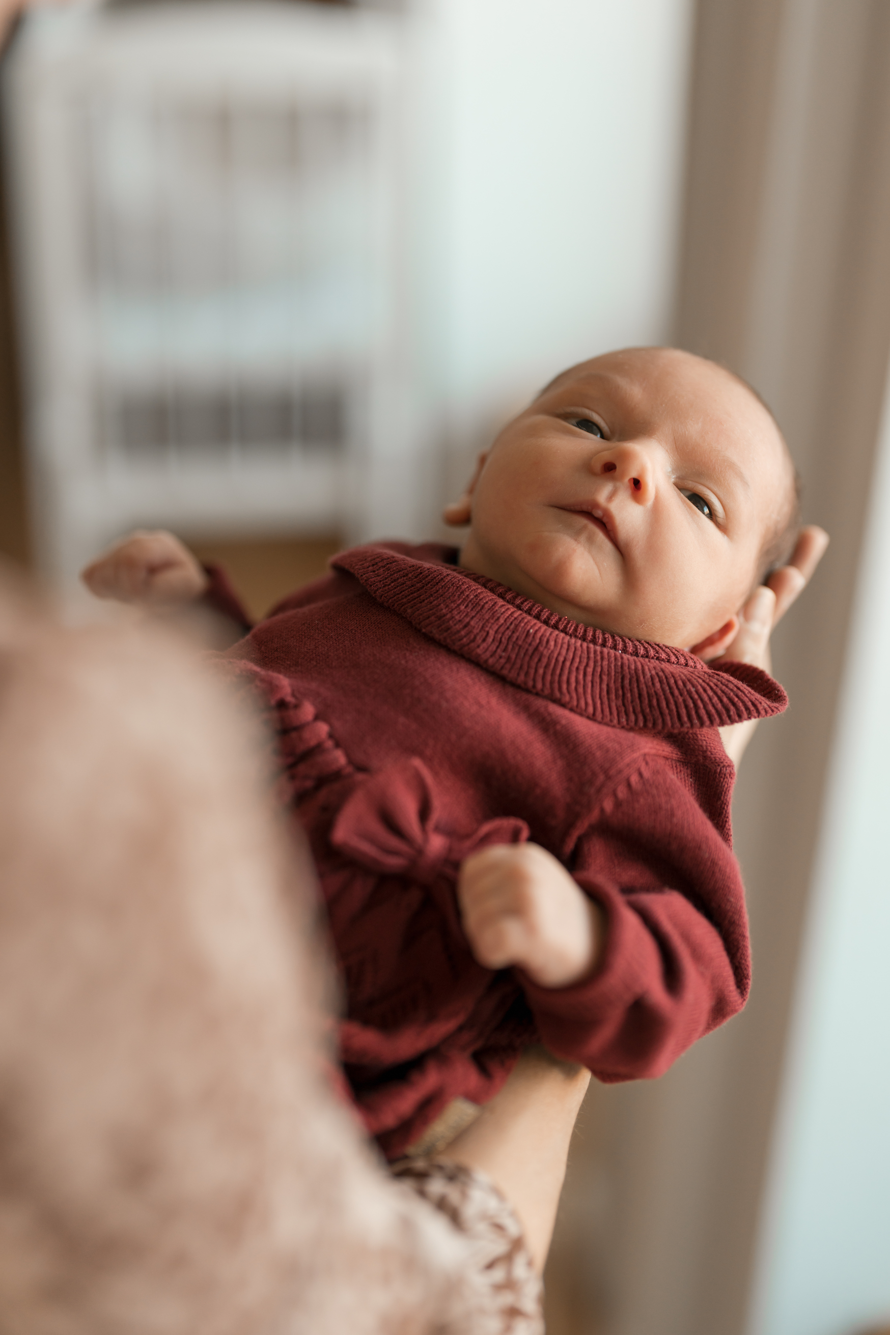 Baby auf dem Arm in Köln